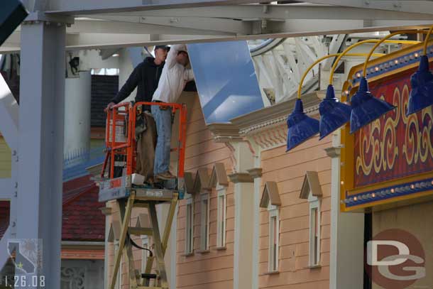 Some workers taking advantage of the break in the storms to do some work on Toy Story Mania