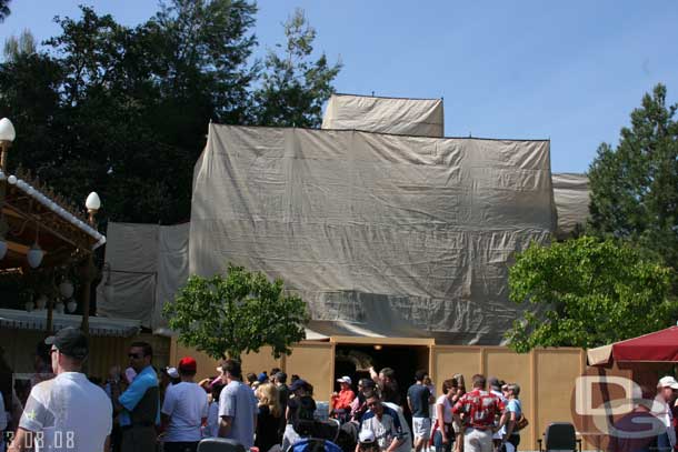 The facade by Plaza Gardens is covered