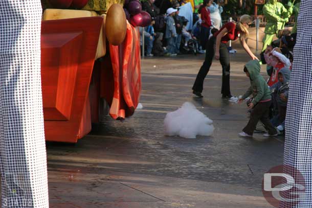 Throughout the parade water, bubbles, soap bubbles, balls, etc.. come flying toward you..