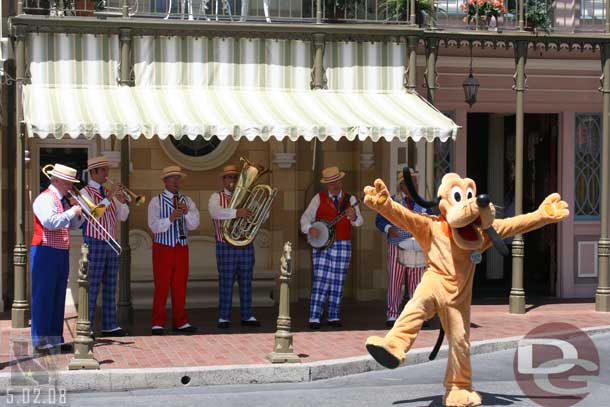 Pluto out on Main Street dancing