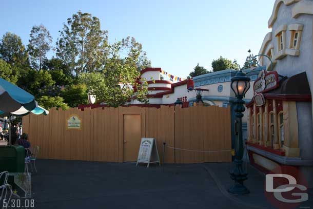 The Gas station and water fountains are behind a wall