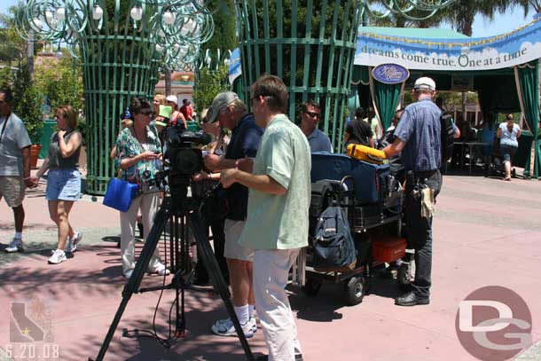 A camera crew out filming the army men