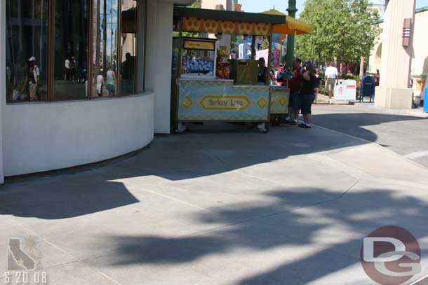 Most of the old tables along the sidewalk have been moved, there were a a couple still out on either side of the hot dog stand.