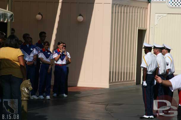 The color guard saluted the College Band which stopped by to watch the retreat.