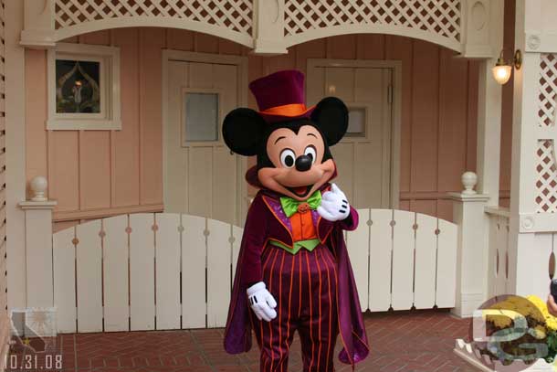 Mickey out for pictures in his Halloween gear