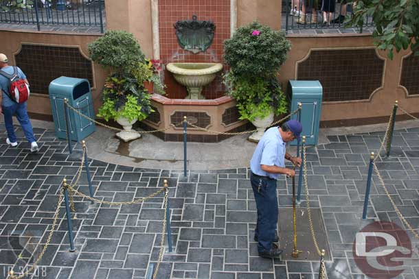 Not sure what he was doing but he turned a valve in a couple places, my guess is it had to do with the fountain