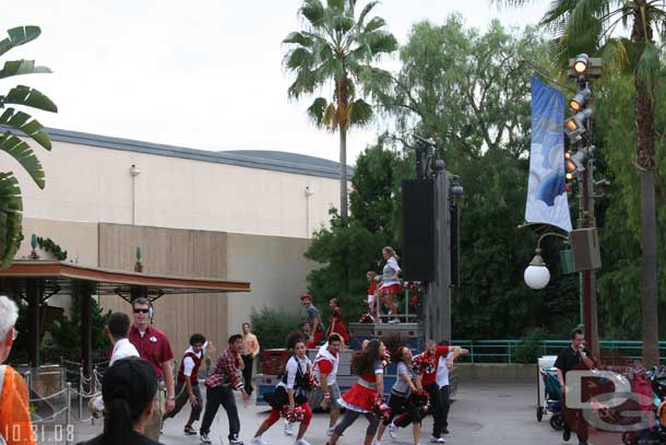 Now a series of shots of the High School Musical 3 show.  Same idea as the first two.. a rolling stage comes out and they perform a medley from the movie