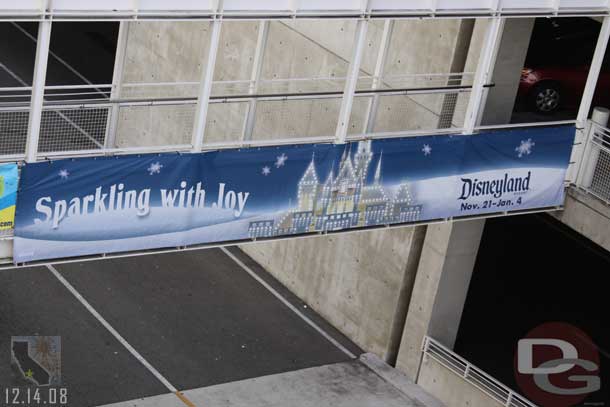 The banner advertising the holidays at the parking structure.