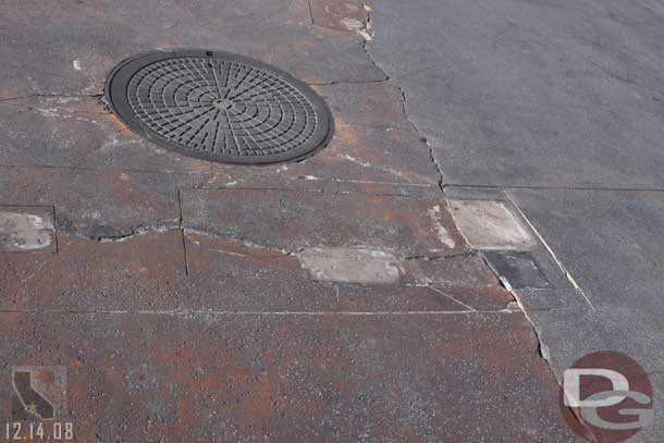 Looks like they are going to cut out and replace the broken concrete?  This was near the smoking area entrance.