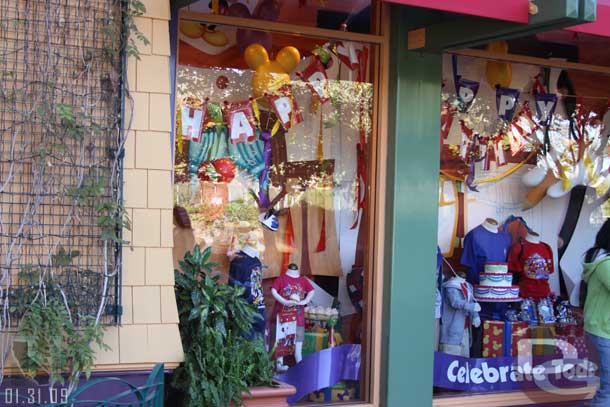 One of the celebration windows at World of Disney