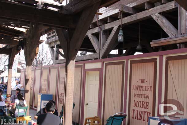 Over at the Wharf the construction walls around the Luck Fortune Cookie now have signs on them.