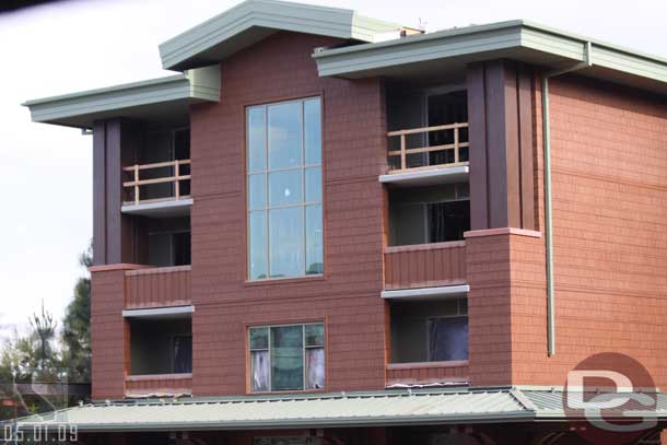 The large two story window is the Grand Villa that has a view of the pool complex (it is a great view, I was able to visit he balcony there on the hard hat tour I went on several weeks ago, no pictures were allowed though)