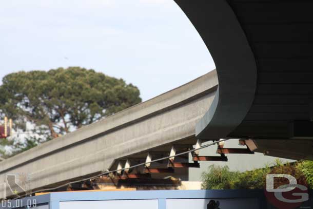 Some visible work in Tomorrowland on the monorail supports.  They stripped away the concrete