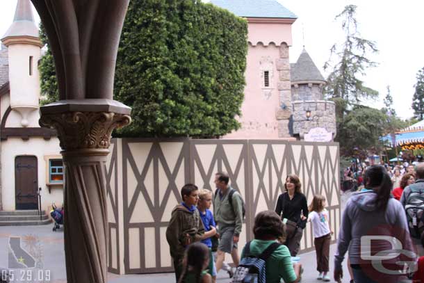 There are walls up around where the merchandise cart usually is in Fantasyland