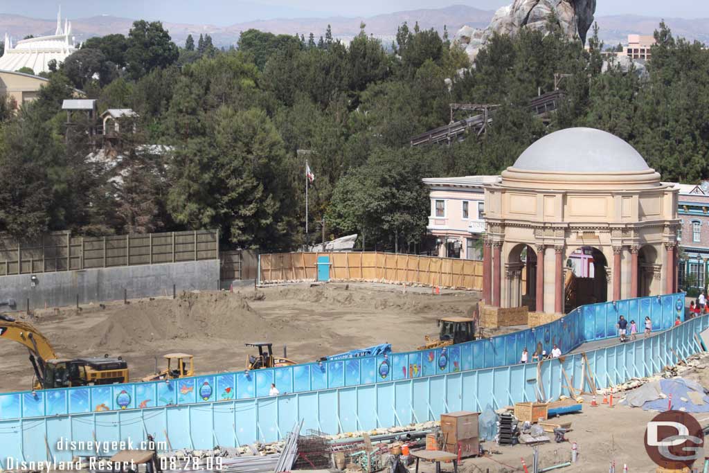 The walkway is now even narrower and the parade no longer comes out this far, also notice they have started to dig for the basement of the Little Mermaid building.