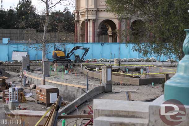 The area around the fountain is slowly taking shape