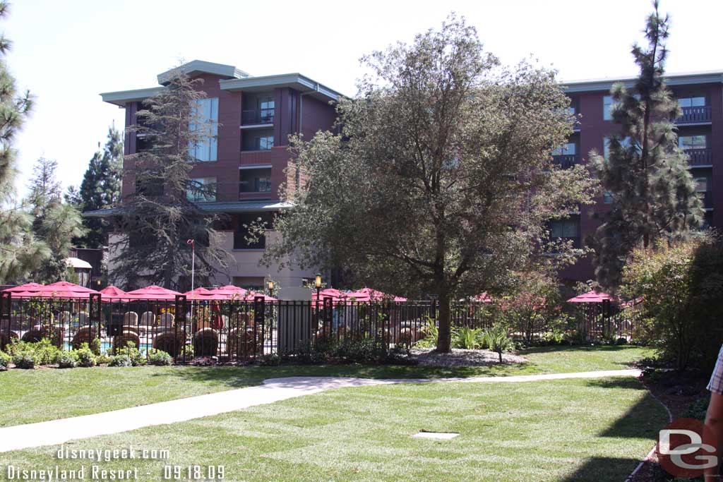 The sod is in and the temporary stairs are gone (also the pool area was open)