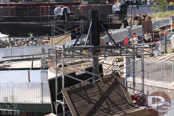 Some of the equipment on the light/speaker poles is being installed