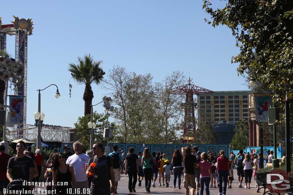 A decent crowd walking around the park