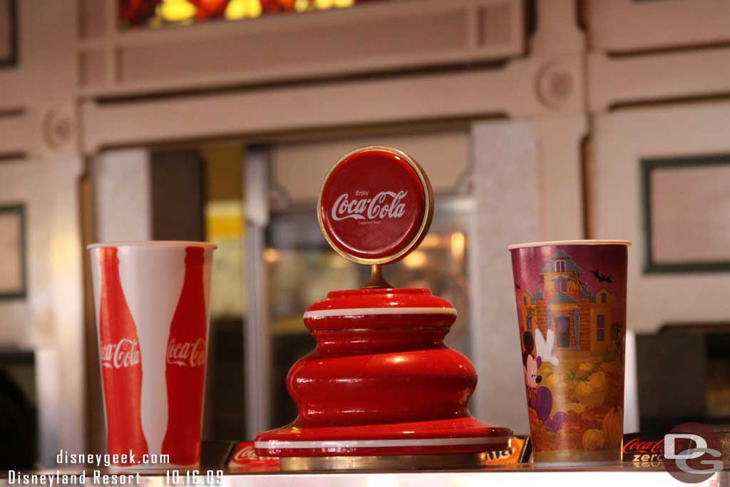 The small cups have a Halloween theme but the large ones are back to plain Coke right now.