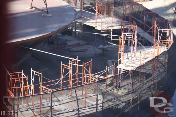 A look over the screen of the swings reveals sandbags and maybe some forms up at the top portion, or that could be wood from the scaffolding, hard to tell