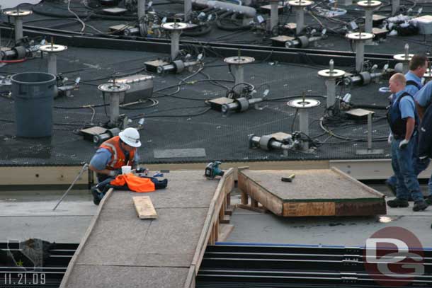 They were taking apart the bridge to the platform (or at least the last piece that connected to the platform was removed)