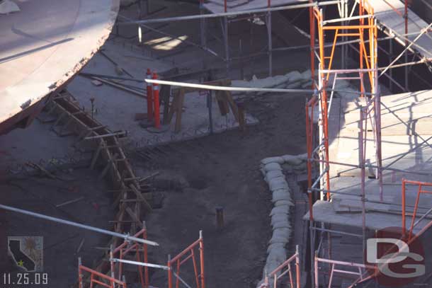 A look down on the Swings work from the Fun Wheel.  Looks like a curb of some sort..