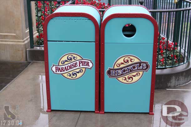 A closer look at the new trashcans.  Guessing they are blue since this is near the Little Mermaid.