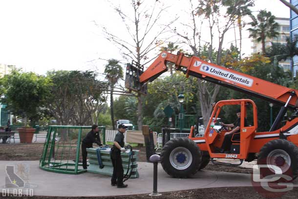 They were cleaning up the support structure for the Downtown Disney tree.