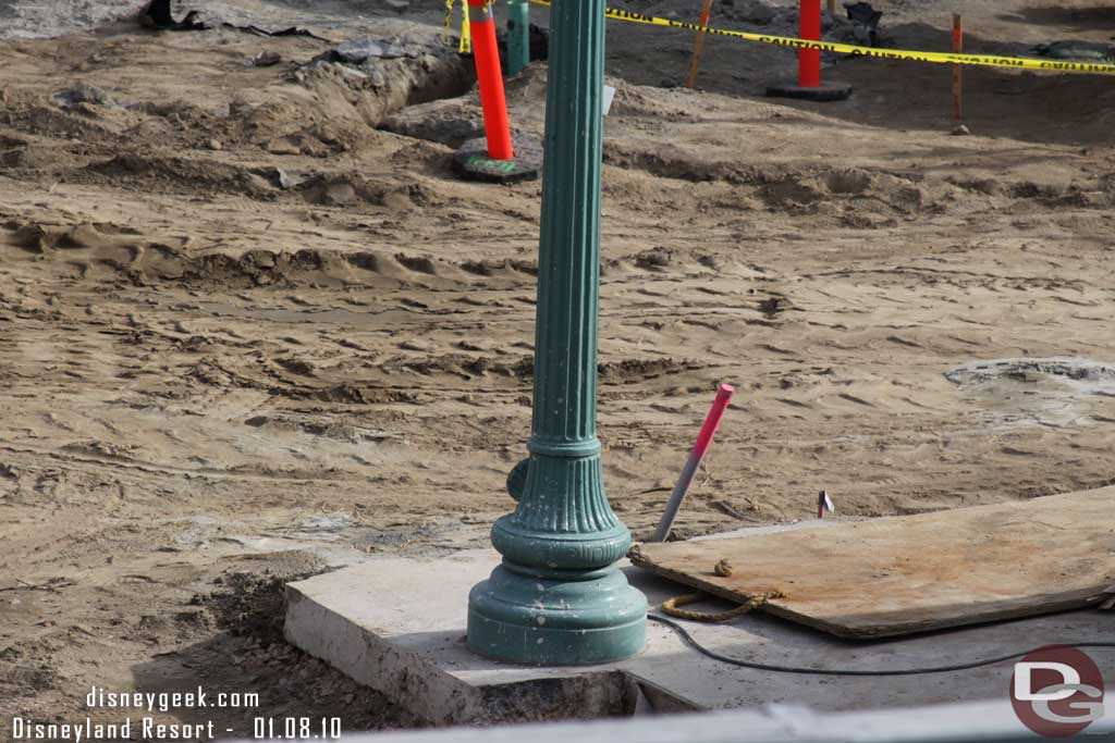 Where they cut out the old concrete.. right around the lightpost