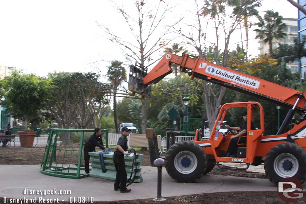 They were cleaning up the support structure for the Downtown Disney tree.