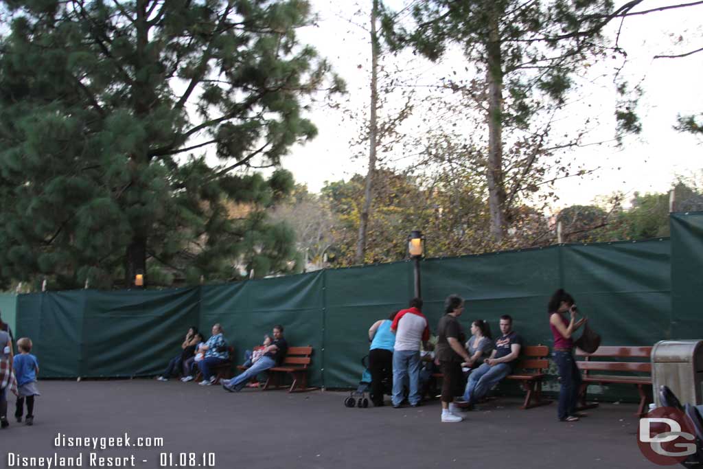 The Rivers of America are being drained so there is a wall, tarp up around it.