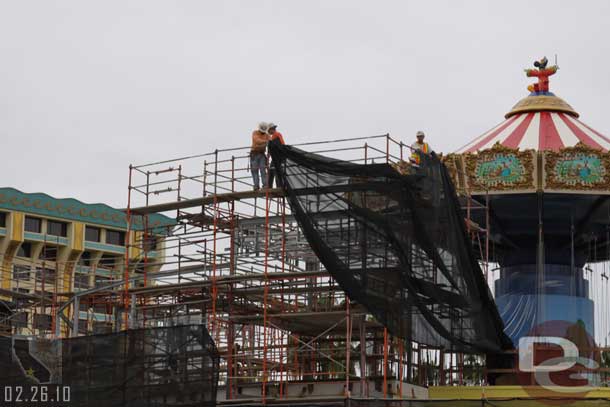 They were putting up the screen around the scaffolding