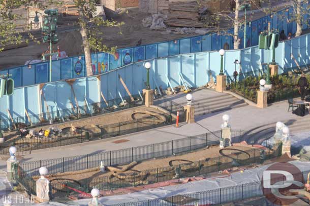 This area is next to get plants.  The painting looks done.  The rumor is those circles with something in the middle are fountains, think the leapfrog fountains they have at EPCOT.