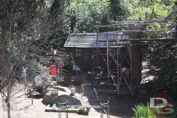 Work on the tree near the cabin.