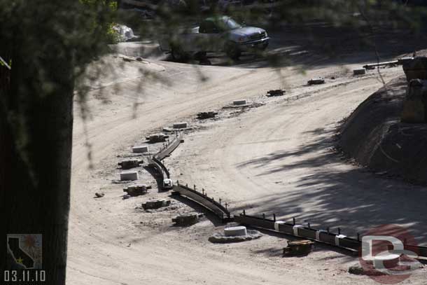 Some sections of track are laid out and awaiting installation.