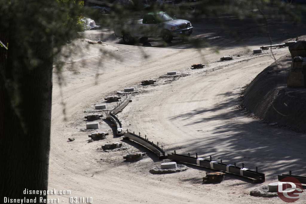 Some sections of track are laid out and awaiting installation.