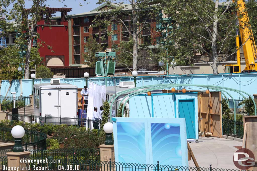 They were prepping the area to open.  Here you can see the walls and drapes going around the programming trailers for World of Color. 