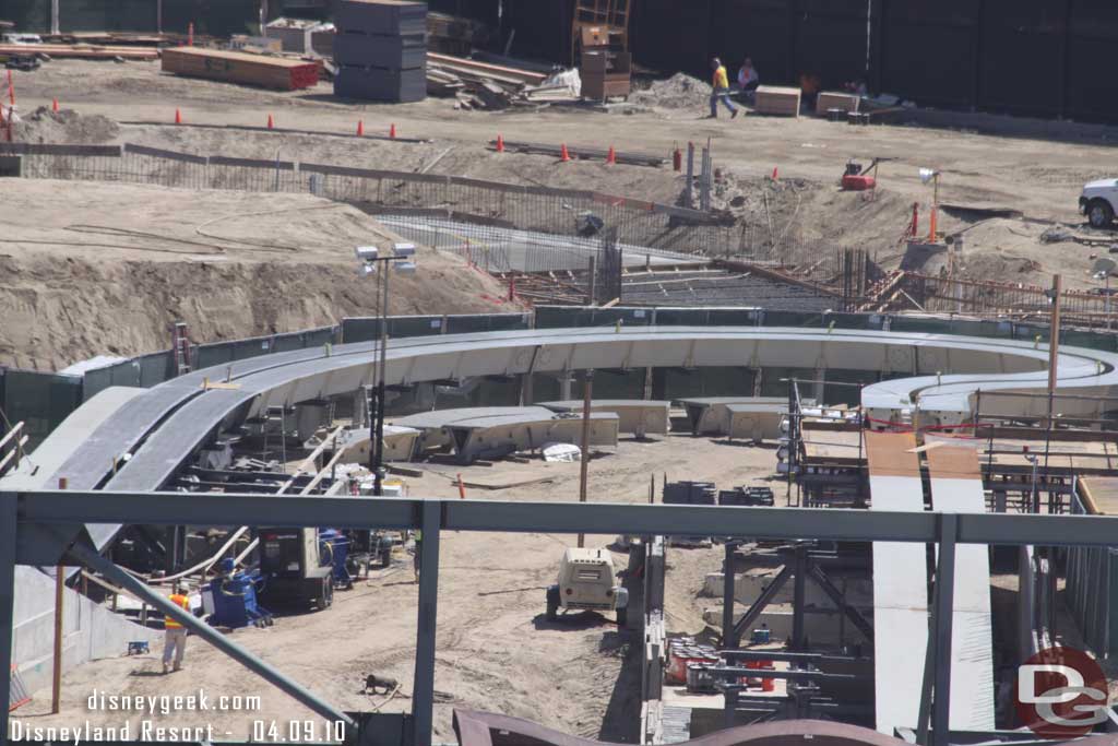 Looks like a surface has been added to the white sections of the track.  Also notice in the background the form work.