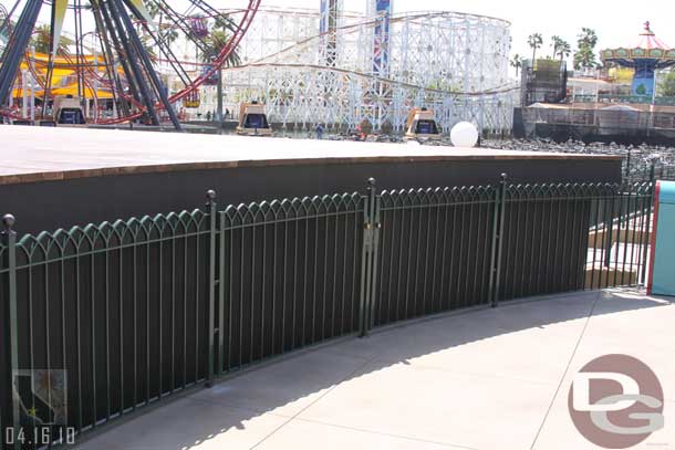 The fence in front of the stage looks to be removable or at the least has a couple of gates to open.  So I am guessing the stage can be set to that same level.