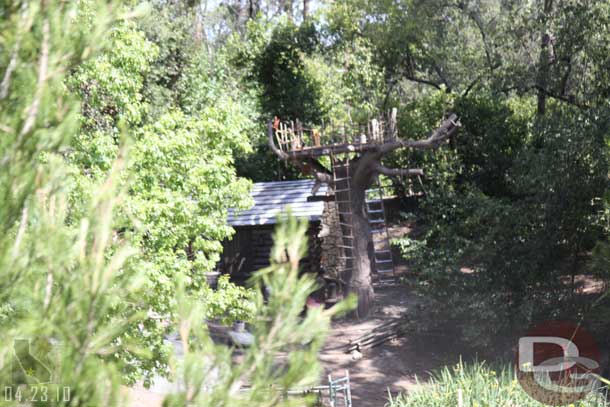 The scaffolding is down and it looks like a partial treehouse or lookout tower was built.