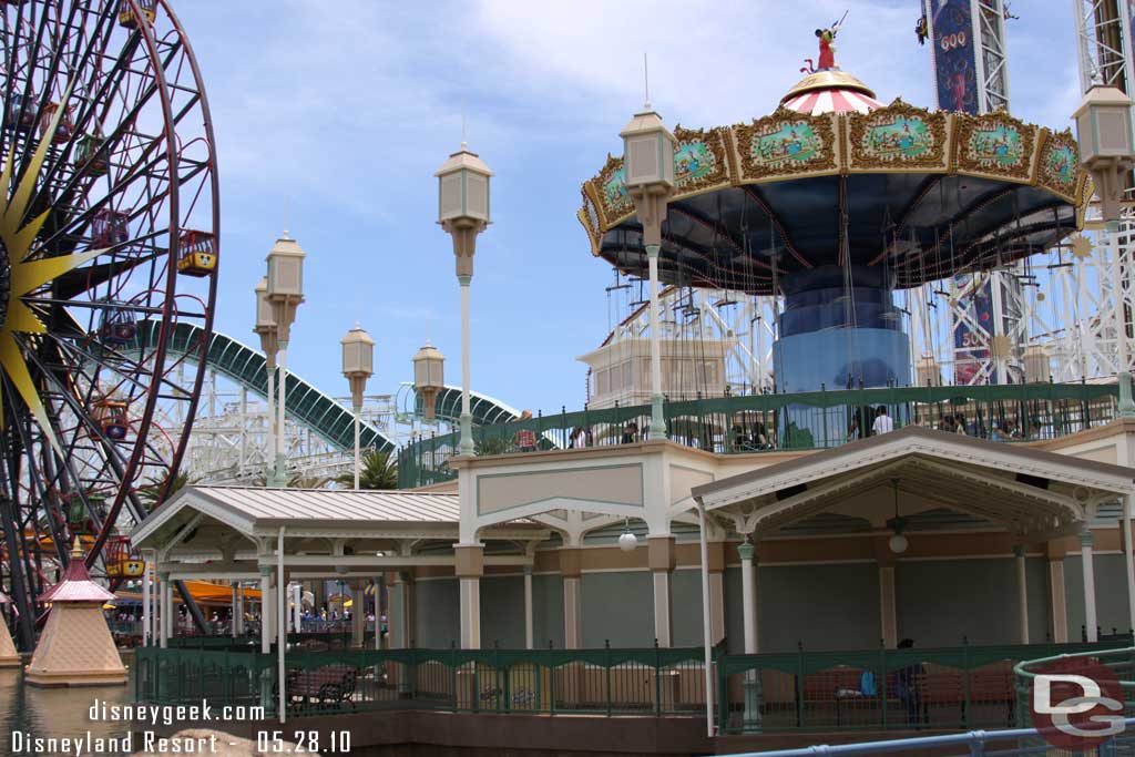 There are benches around the walkway under the swings.