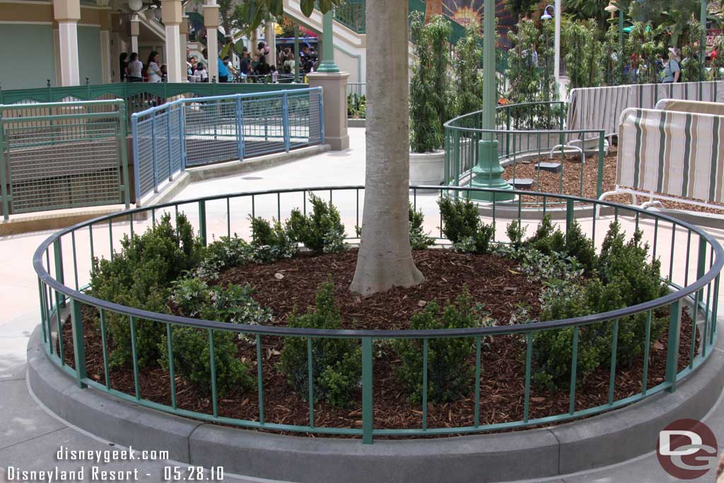 A planter around one of the trees