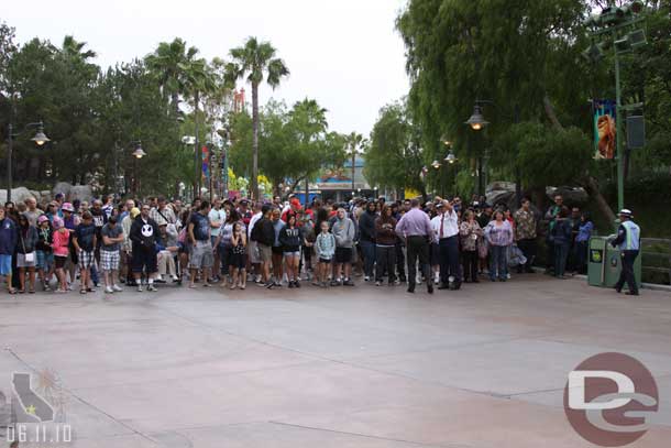 Made it around to the entrance path and realized the park had not opened yet so we had the choice to wait and let the running of the guests commence or try and wade through them.  We waited...