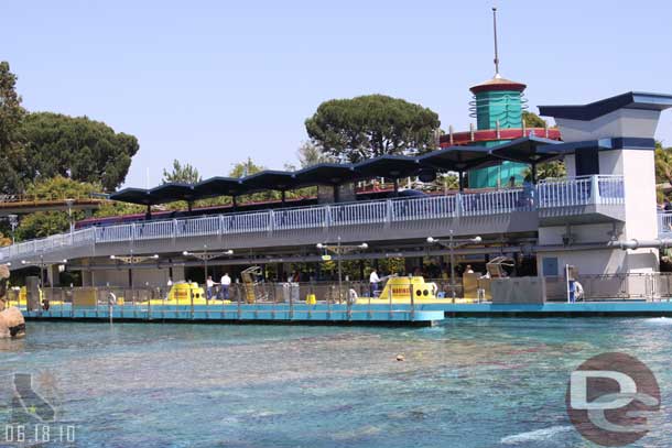 Noticed Monorail Red partially out of the station but stopped.  Monorail Orange was on the other side of the Matterhorn waiting to enter the station.  By the time we got around to Small World they were moving again.