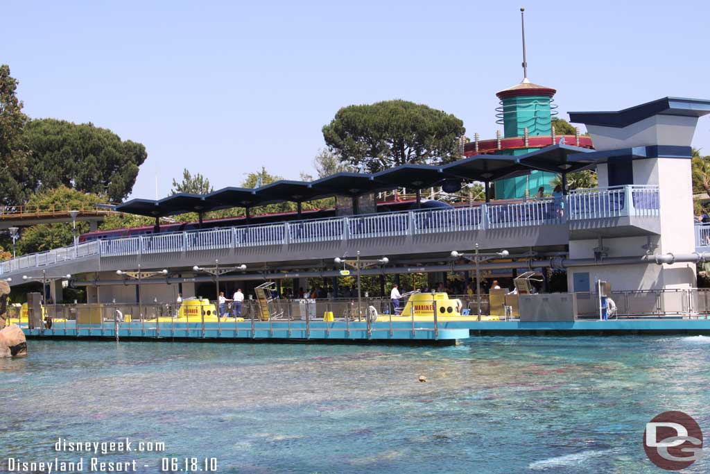 Noticed Monorail Red partially out of the station but stopped.  Monorail Orange was on the other side of the Matterhorn waiting to enter the station.  By the time we got around to Small World they were moving again.