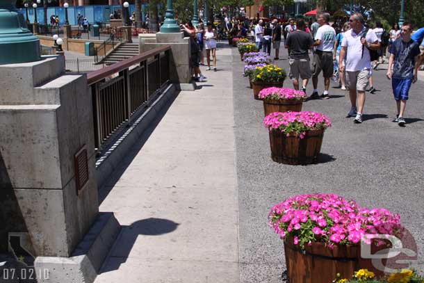 A nice touch.. guessing this is to help keep people from going under the ropes once this area is blocked off for World of Color. (It is a reserved area)