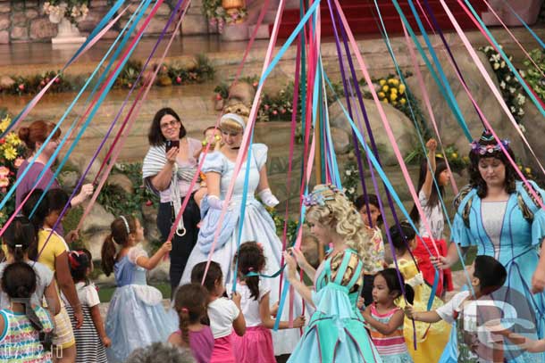They come down off the stage to dance/interact with the guests for one song