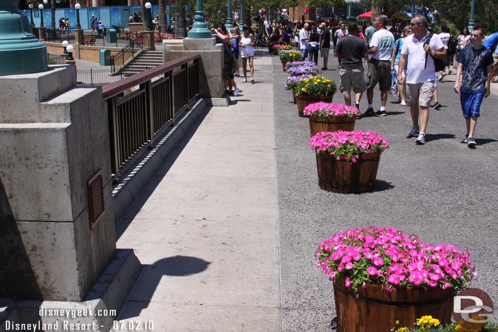 A nice touch.. guessing this is to help keep people from going under the ropes once this area is blocked off for World of Color. (It is a reserved area)