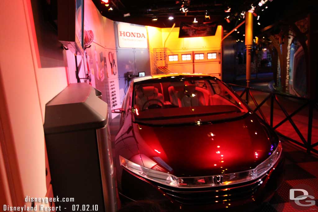 They have one of the entrance pods that showcases the FCX Concept car which features a fuel cell.